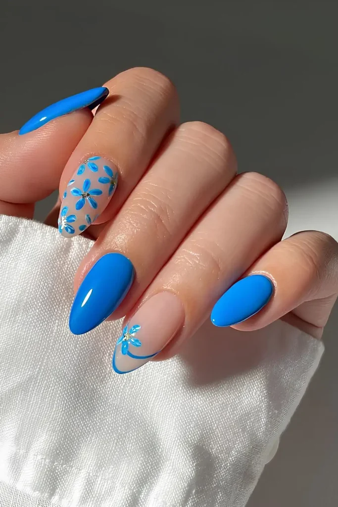 Blue Nails With Floral Accent and Double Line Tip for a Chic Modern Look