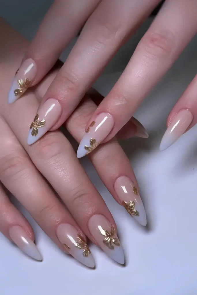 Blue Ombre Nails With Gold Flower Art That Looks Luxurious