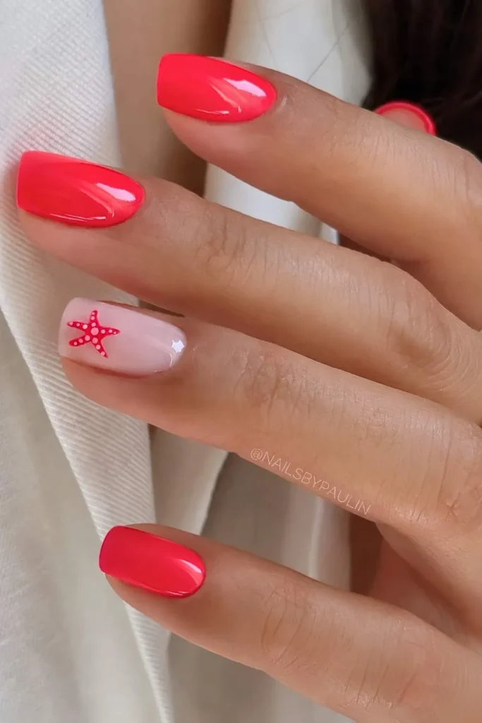 Bright Red Nails With Accent Starfish for a Fun Beach Inspired Look