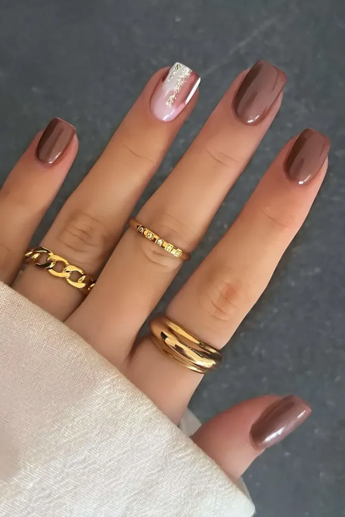 Brown Manicure With Glitter Accent Nail
