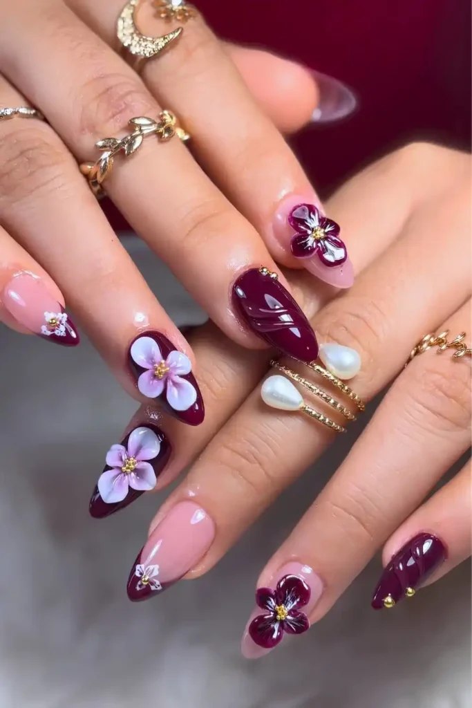 Burgundy Manicure With Sculpted Flowers That Feels Luxurious