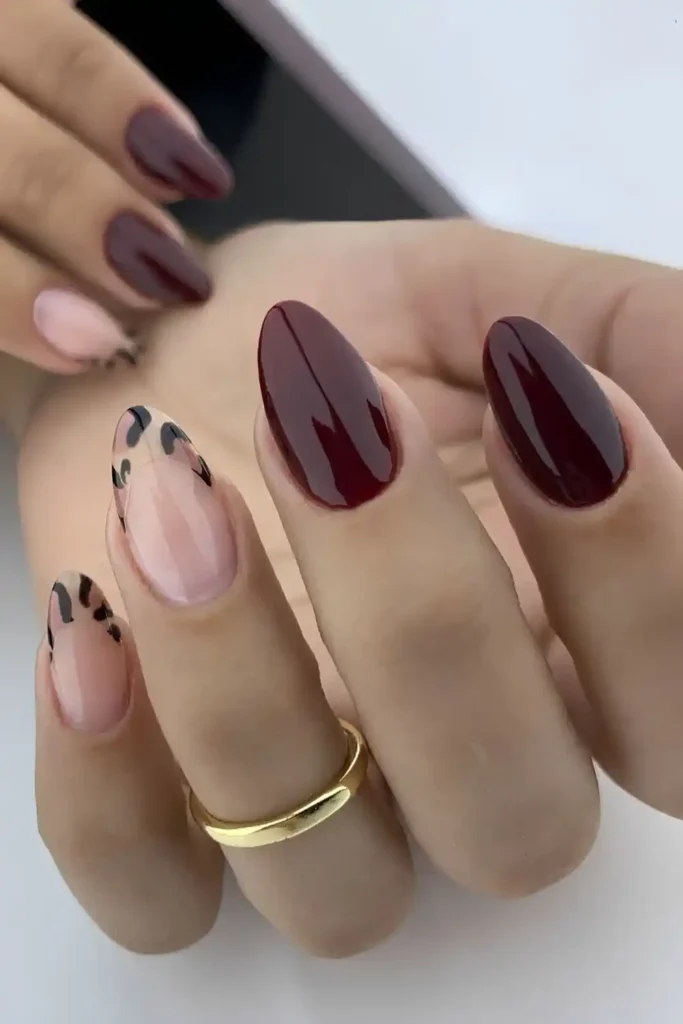 Burgundy Nails With Accent Animal Print for a Bold Trendy Twist