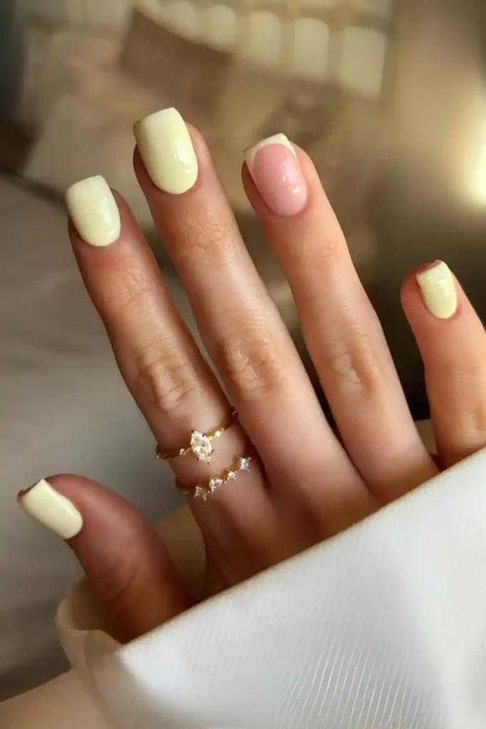 Butter Yellow Nails With Accent French Tip for a Bright Sunny Look