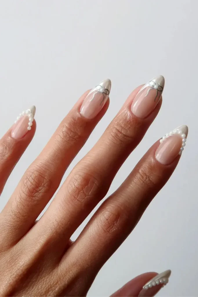 Coquette French Tips With Pearls and Bows for a Cute Look