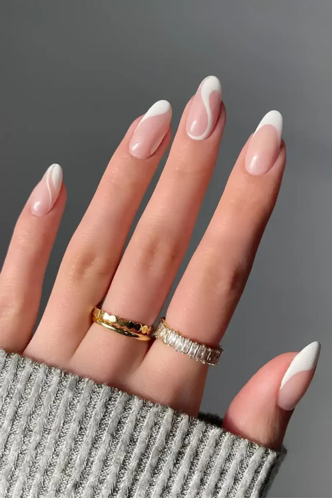 Creamy White Swirly Nails With an Elegant Minimal Finish