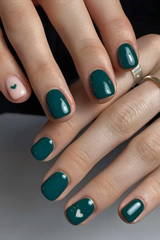 Dark Green Nails With Heart Art for a Sweet Minimal Touch