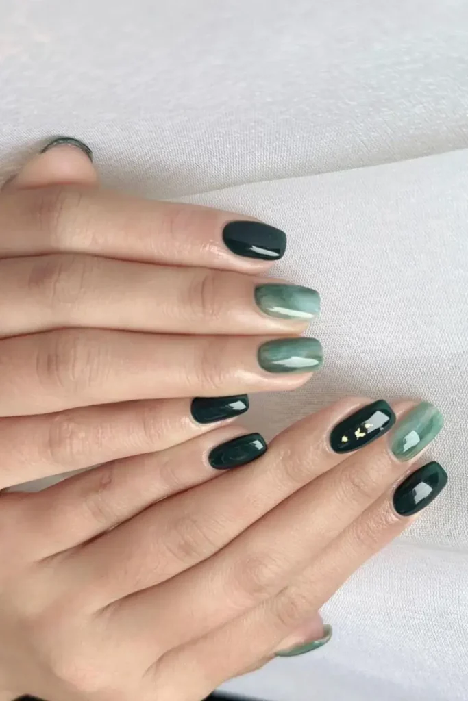 Dark Green Nails With Jelly Marble Accents That Look Unique