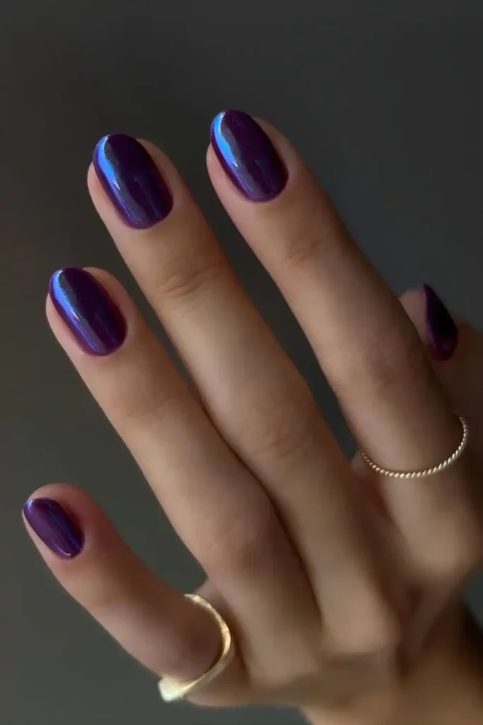 Dark Purple Chrome Manicure With a Glossy Mirror Effect