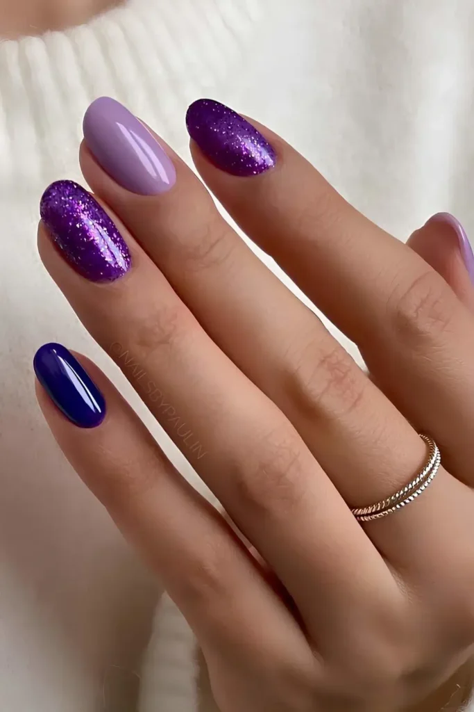 Dark Purple Nails With Glitter Accents That Sparkle Beautifully