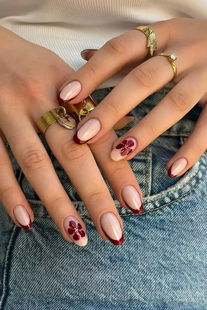 Dark Red French Nails With Blooming Flower Accents for a Romantic Look