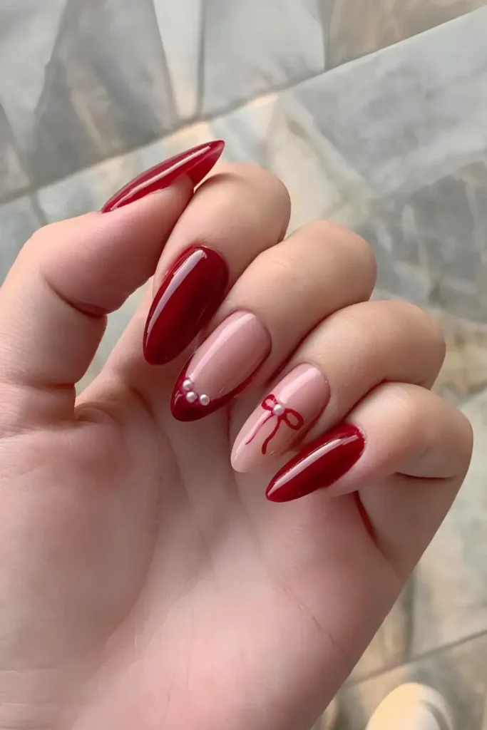 Dark Red Nails With Bows and Pearls That Feel Rich and Elegant