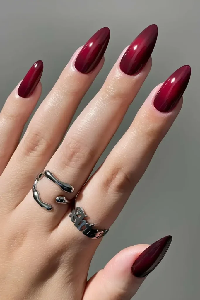 Deep Red Aura Manicure for a Bold Glam Look
