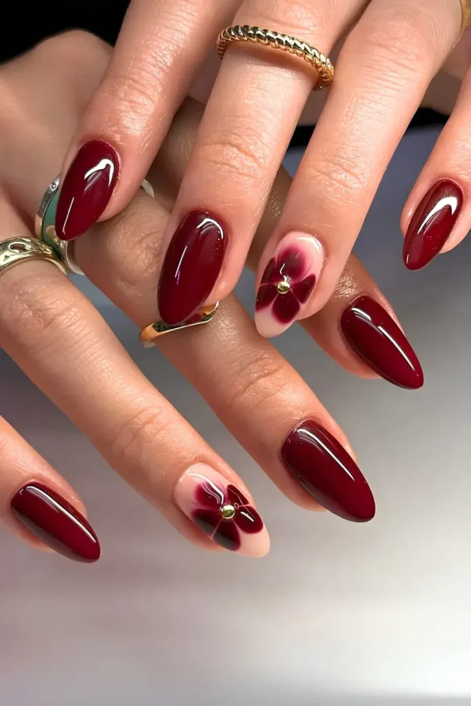 Deep Red Mani With Blooming Flower Accents That Looks Stunning