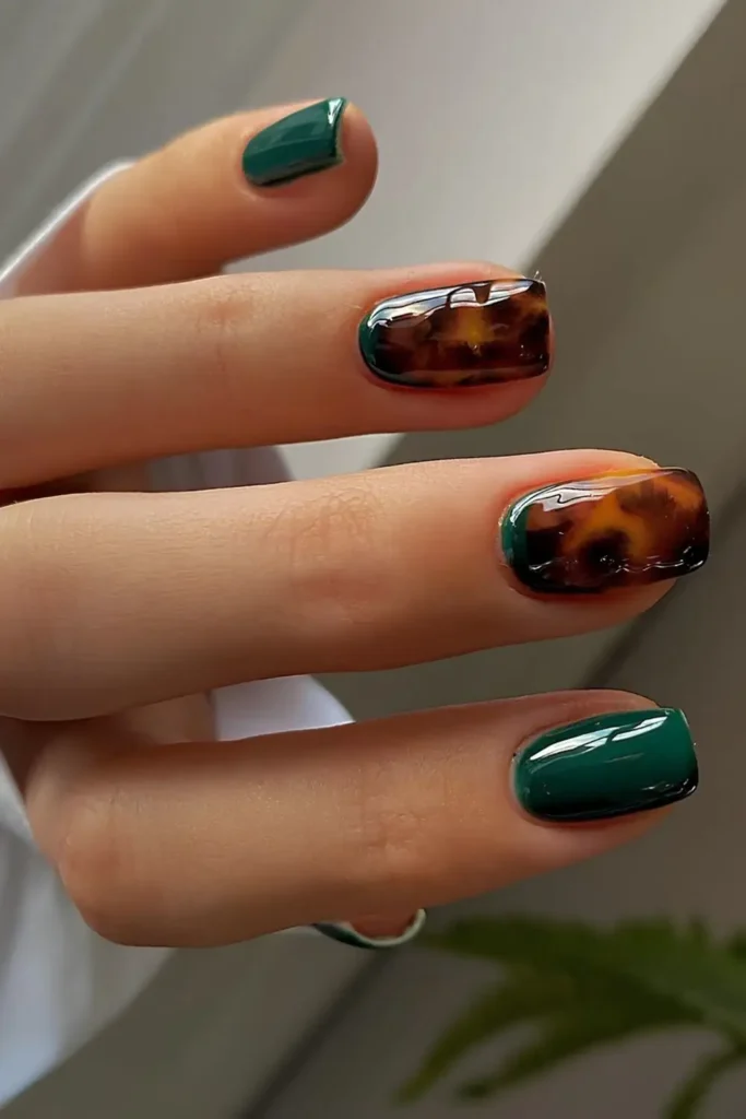 Emerald Green Nails With Tortoise Shell Details for a Trendy Finish