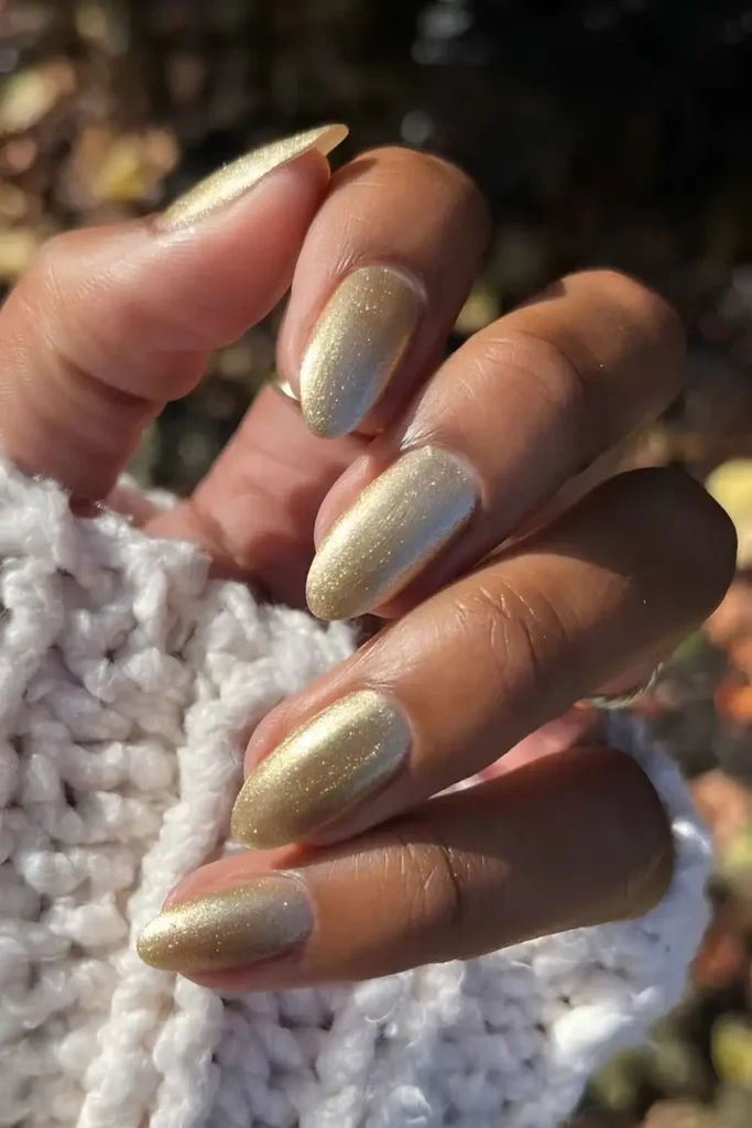 Fine Glitter Gold Manicure That Sparkles From Every Angle