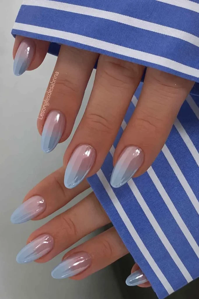 Glazed Blue to Clear Ombre Nails With a Seamless Glossy Fade