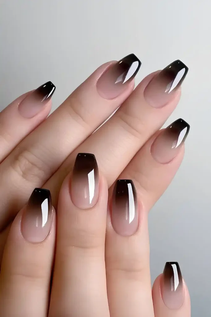 Glossy Black Ombre Manicure With a Smooth Luxurious Fade
