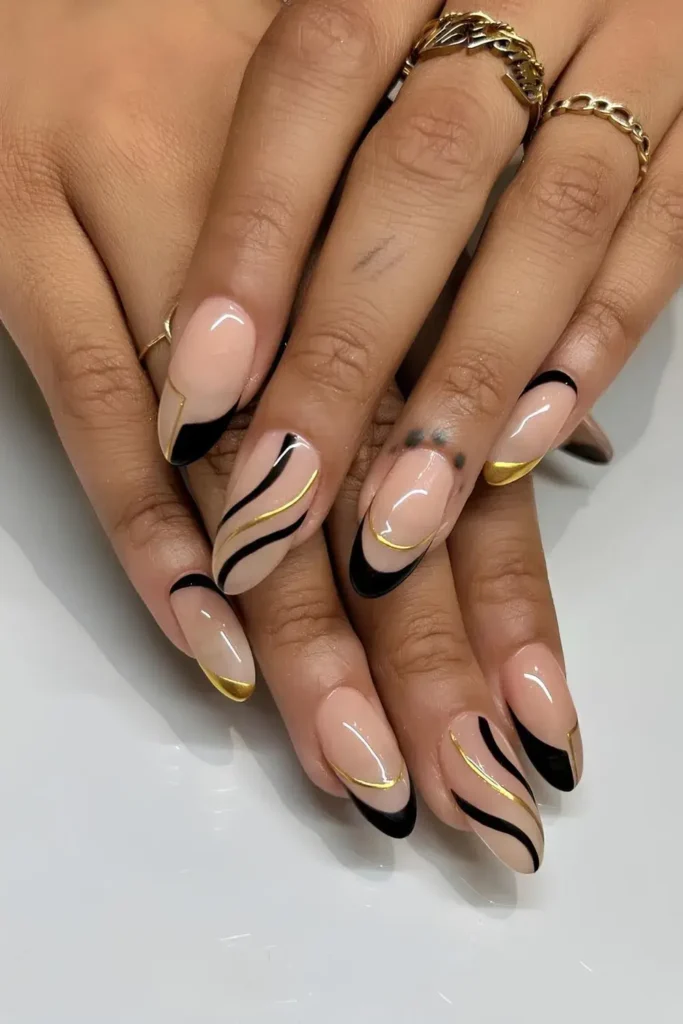 Gold and Black Nails With Swirls for a Chic Style