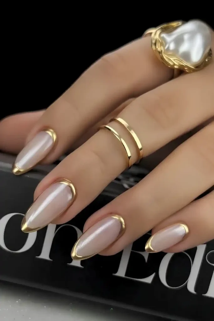 Gold Border French Tip Mani on a White Base That Feels Luxurious