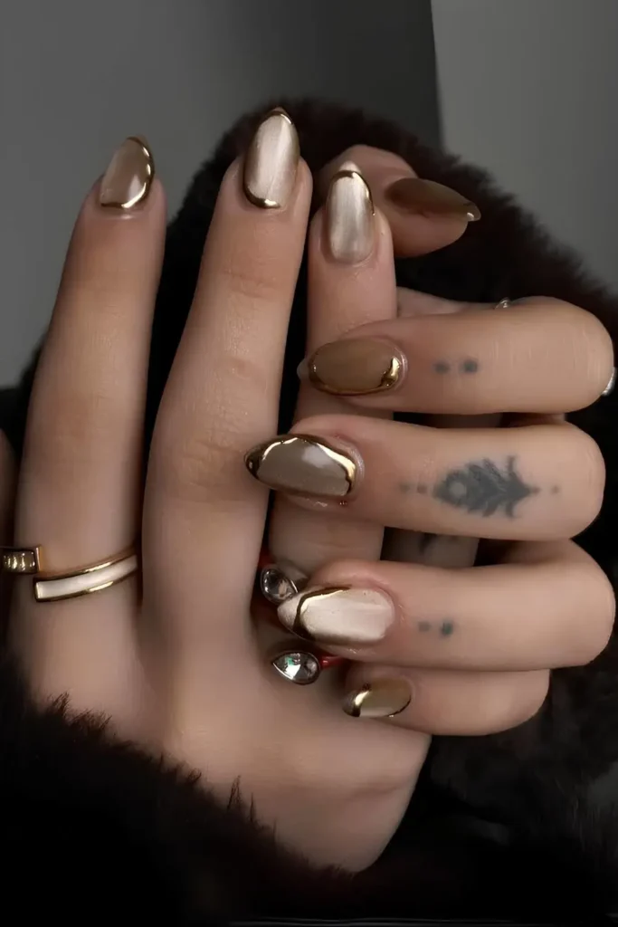 Gold Cat Eye Nails With Metallic Accents That Glow Beautifully