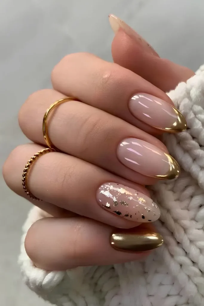 Gold Chrome Nails With Foil Flake Accents That Sparkle Elegantly
