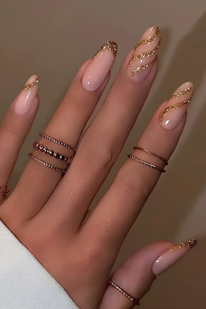 Gold Glitter French Mani With Accent Swirls That Adds Instant Glam