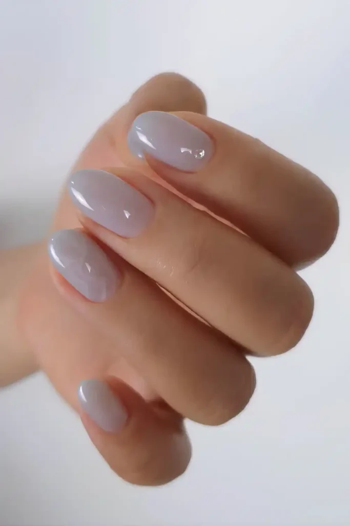 Gray Jelly Nails With Marble Accent for a Glossy Luxe Finish
