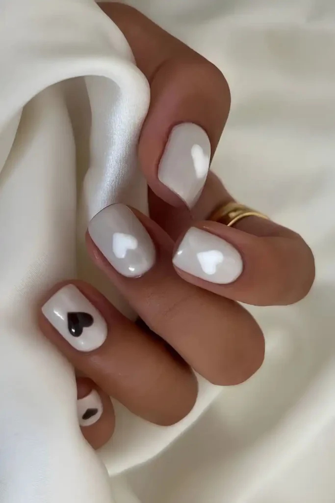 Gray Nails With Black and White Hearts for a Cute Modern Look