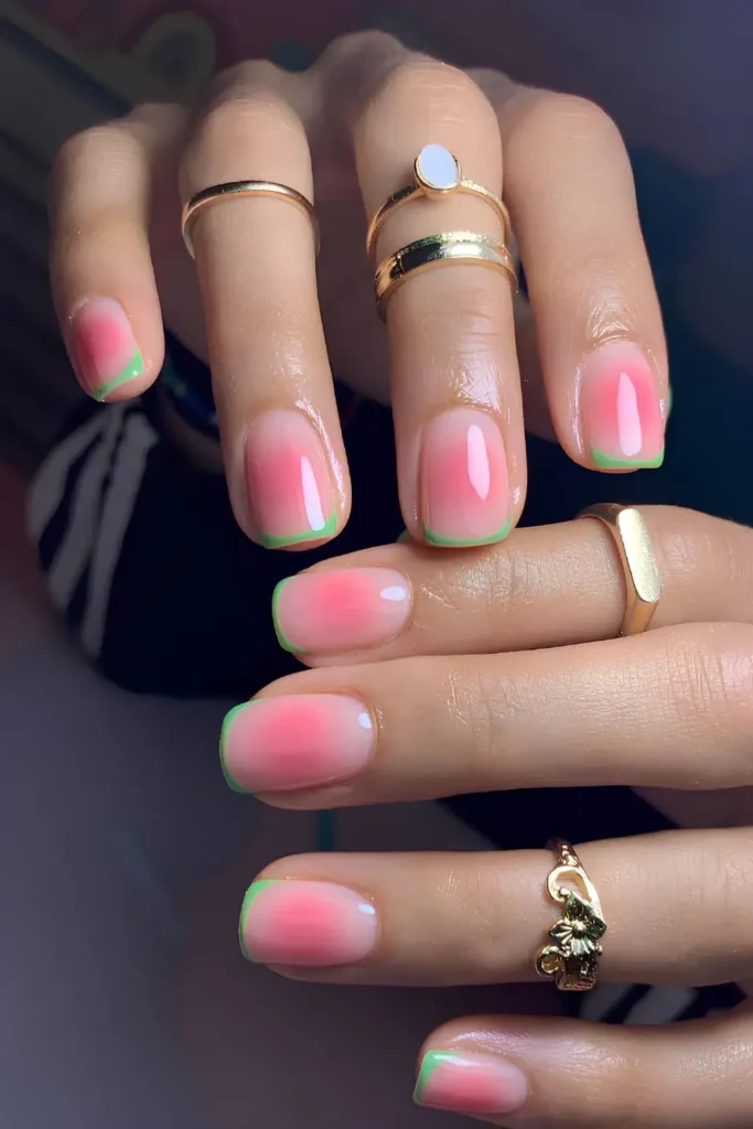 Green French Nails on a Pink Aura Base That Stand Out