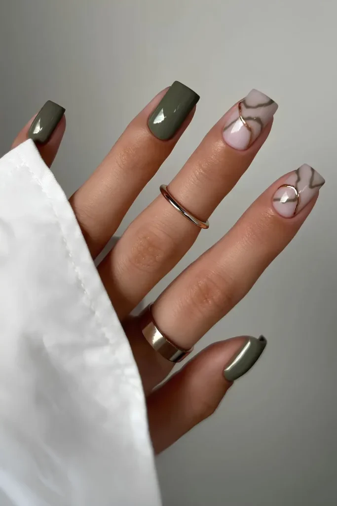 Green Mani With Swirly Accent Nails That Adds an Artistic Touch