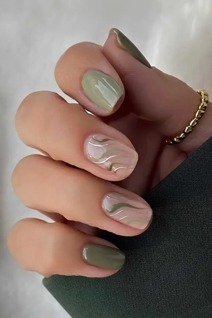Green Nails With Silver Chrome Line Art for a Sleek Modern Finish