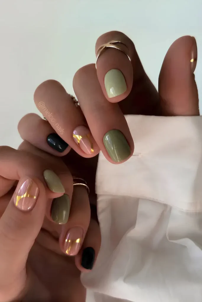 Green Skittle Nails With Gold Accents