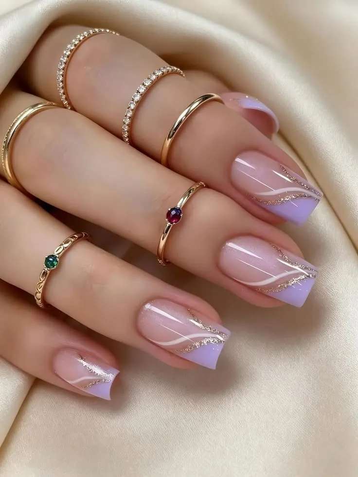 Lavender French Tip Nails With Gold Glitter Swirl Accents