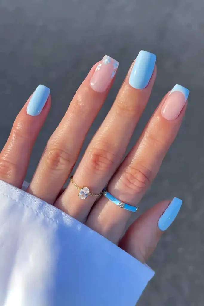 Light Blue Nails With Floral Art for a Soft Feminine Style