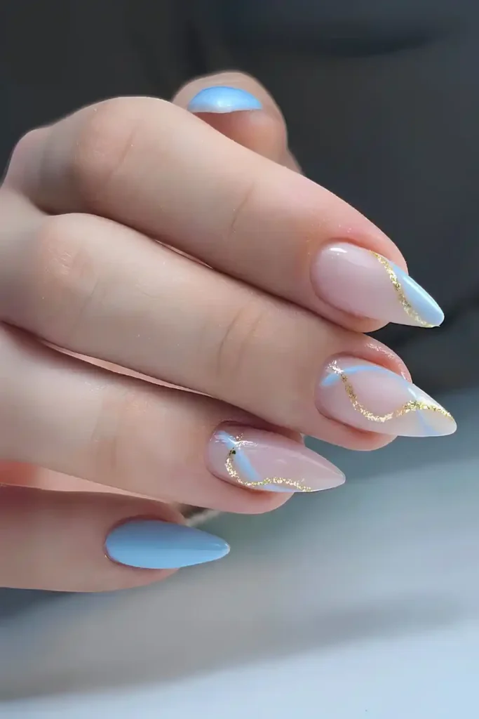 Light Blue Nails With Glittery Swirls That Catch the Light