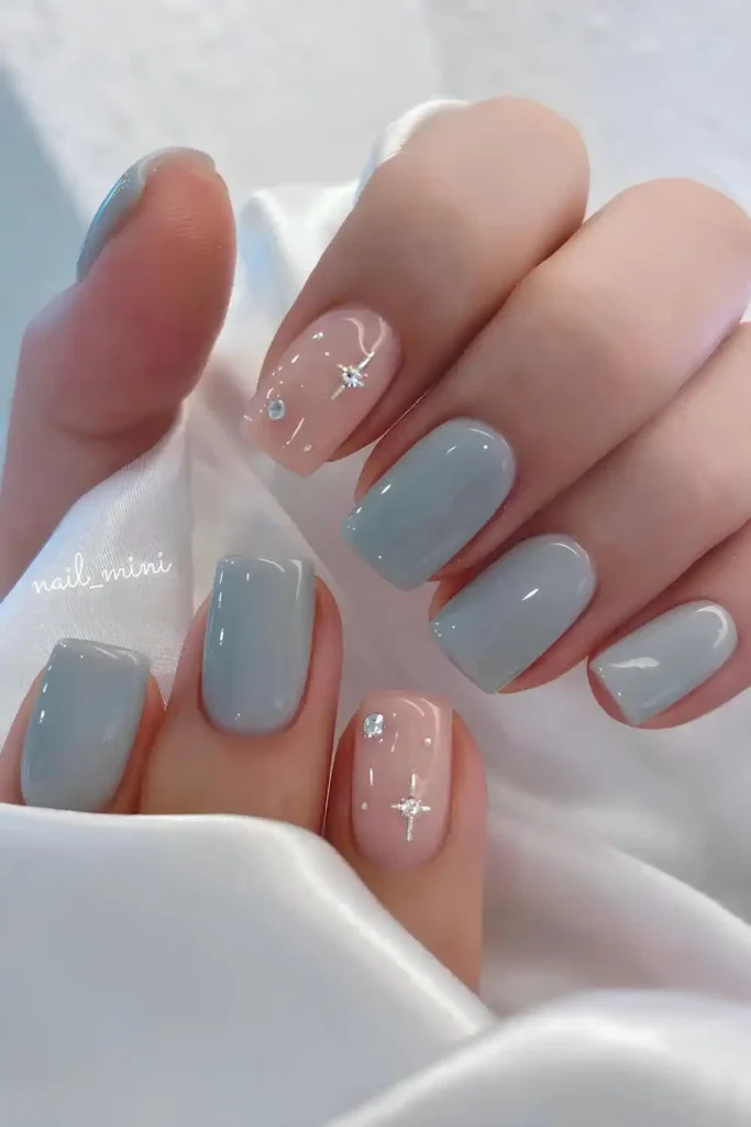 Light Blue Nails With Stars and Sparkles That Shine Bright
