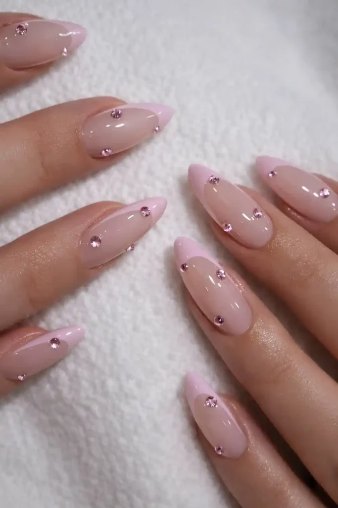 Light Pink French Nails With Rhinestones That Sparkle Elegantly