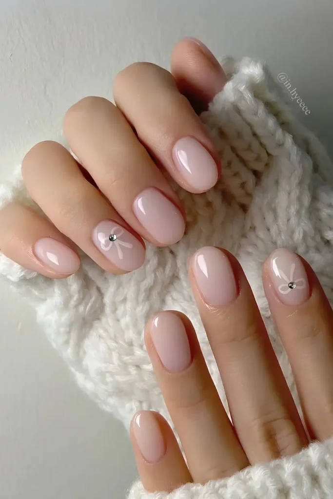 Light Pink Nails With Bows for a Sweet Look