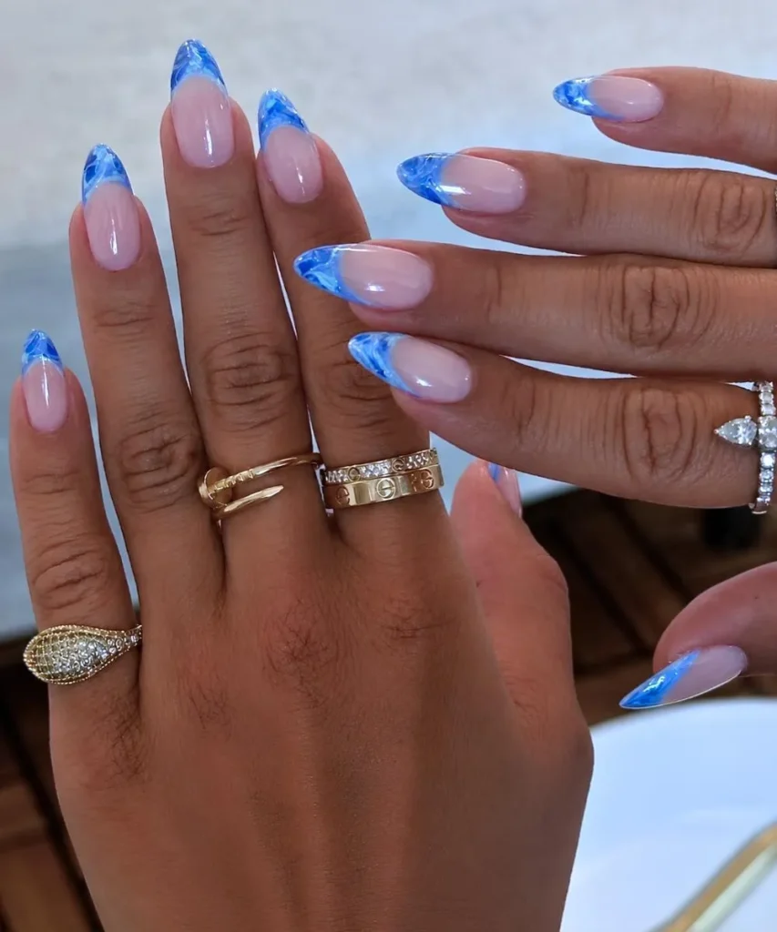Marbled Blue French Tip Manicure With a Sophisticated Finish
