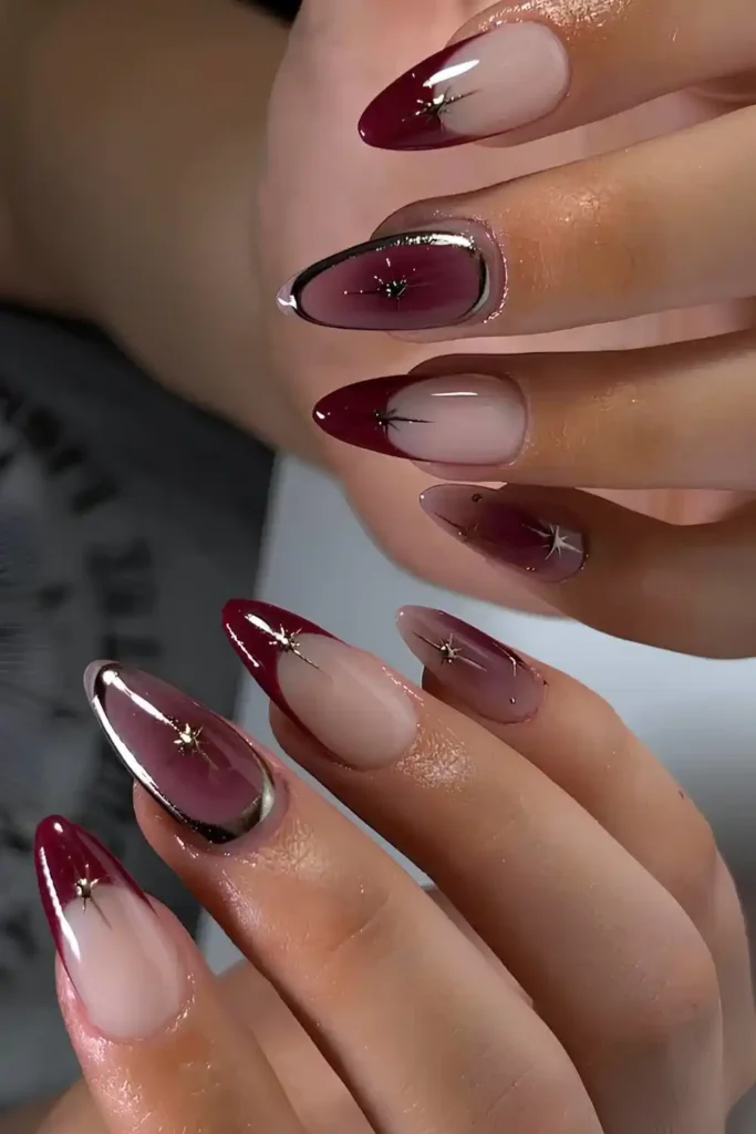 Maroon French Mani With Celestial Accents That Look Magical