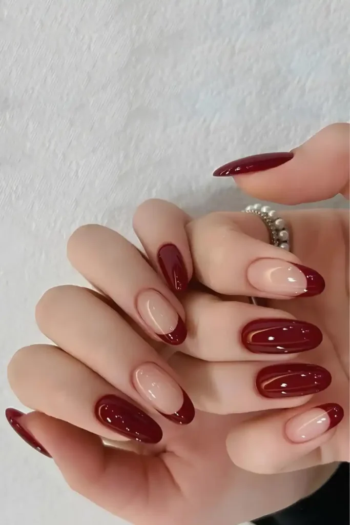 Maroon Red Mani With Accent French Tips That Looks Sophisticated