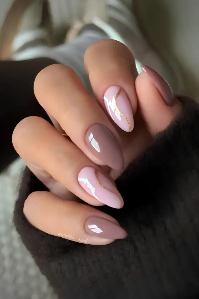 Mauve Nails With Glitter and Swirl Accents That Add Instant Glam