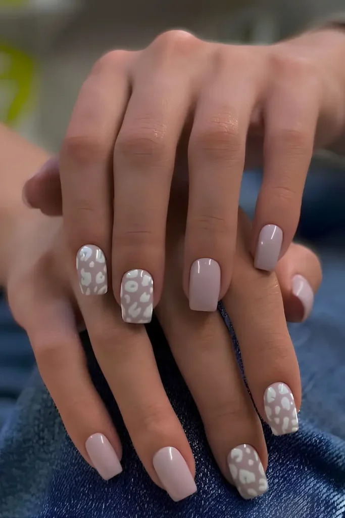 Mauve Nails With Leopard Print for a Trendy Fashion Forward Look