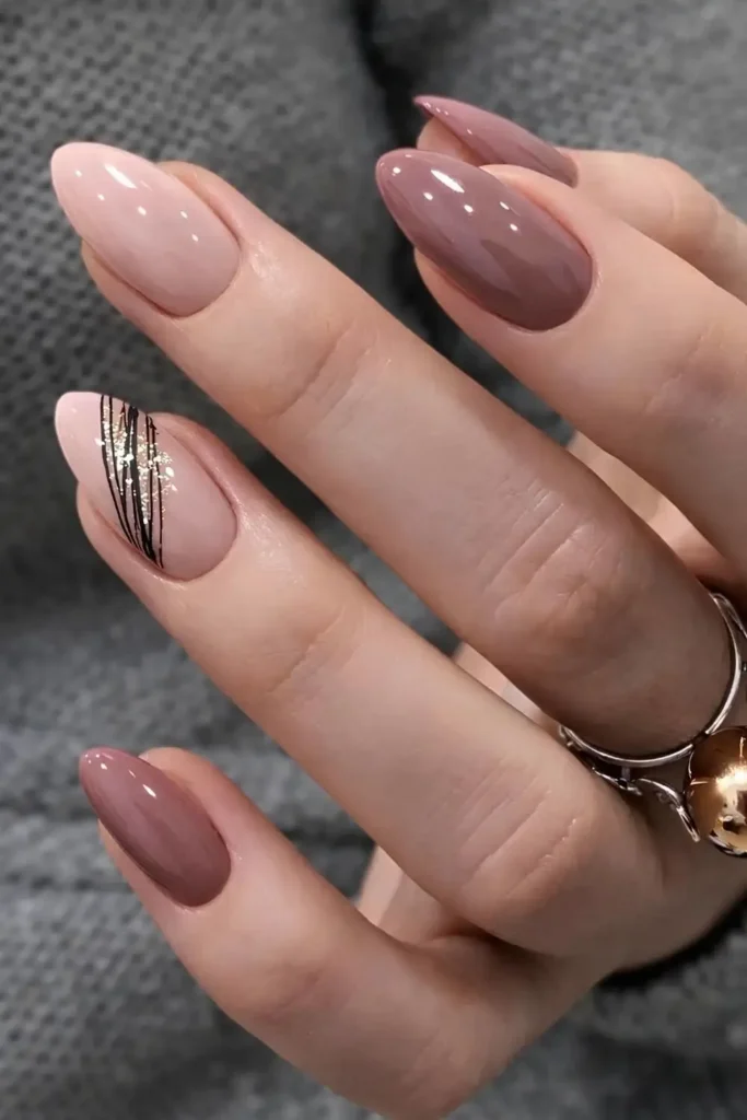 Mauve Nails With Line Art and Glitter for a Chic Style