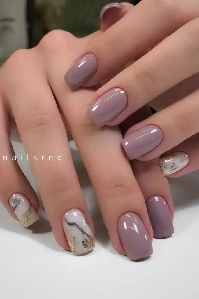 Mauve Nails With Marble Details for a Sophisticated Stone Inspired Look