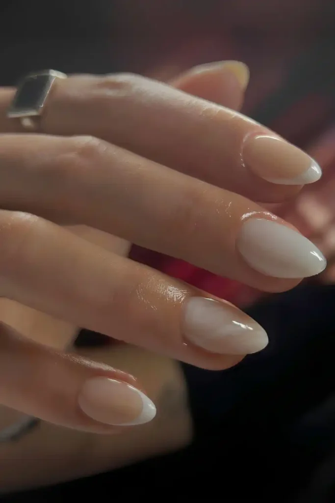 Milky Nails With Accent French Tips and Marble Swirls That Blend Classic and Trendy