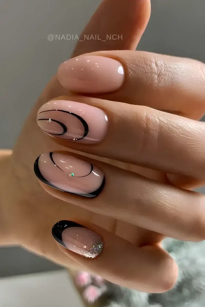 Milky Nails With Black Swirl Art for a Chic Contemporary Style