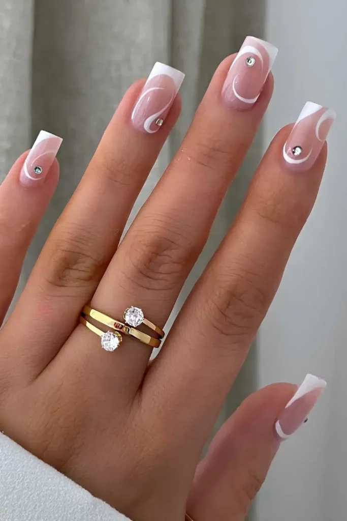 Milky Nails With Gems and White Swirl Art