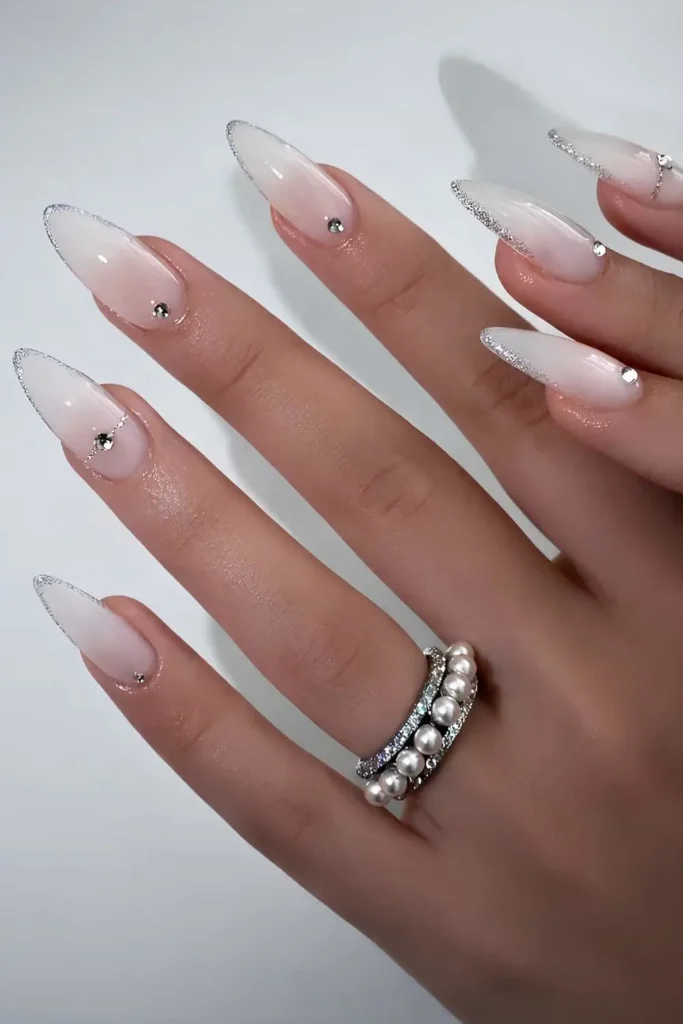 Milky Nails With Glitter French Tips and Rhinestones
