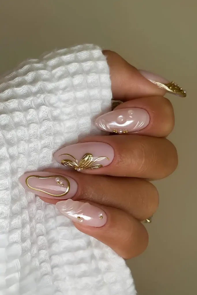 Milky Nails With Gold Chrome Details and 3D Designs That Look Luxurious